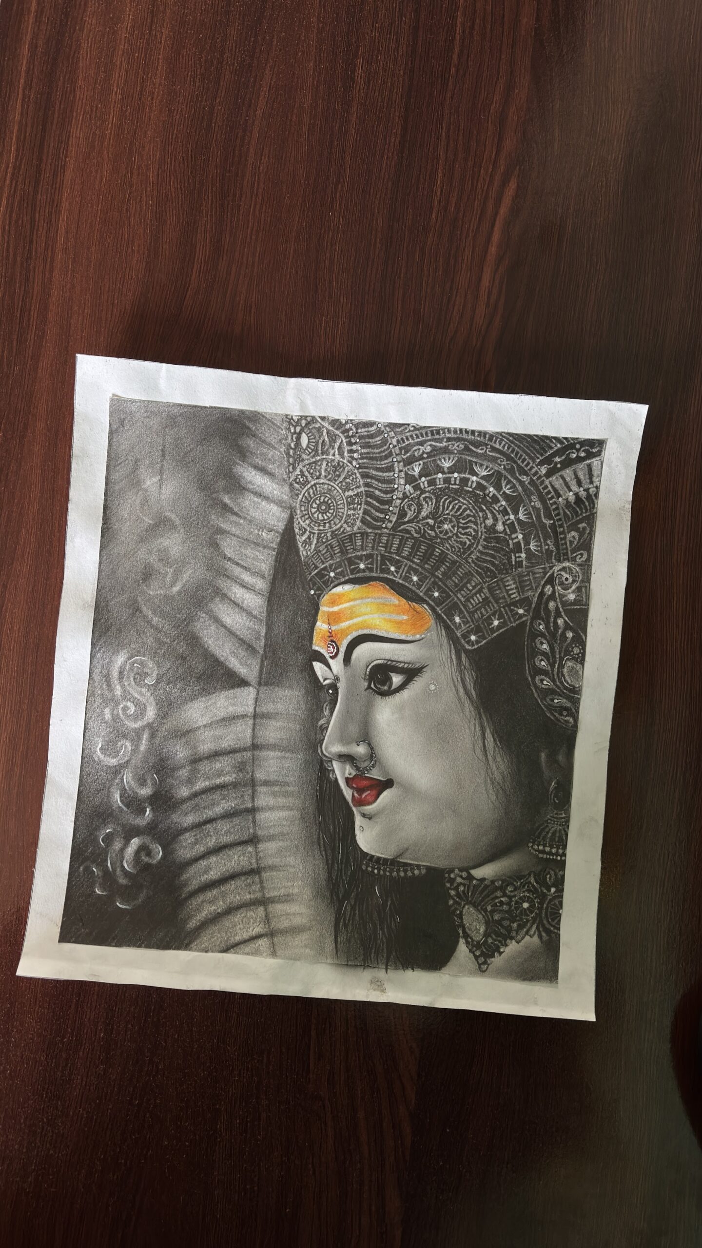 Charcoal portrait titled Inner Light by student Tanvi Bose